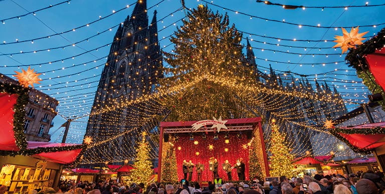 Cologne Cathedral and the Christmas Market at dusk
